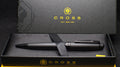 Black pen set with 'Cross' branding on a black box