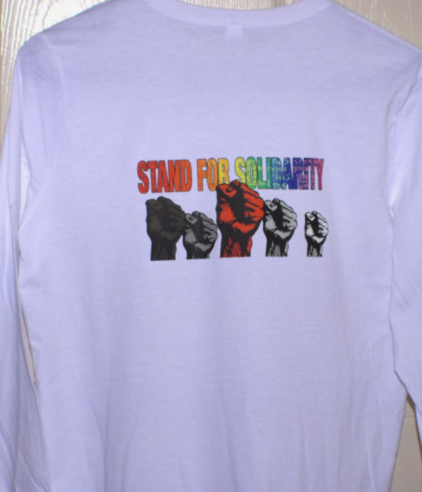 White long-sleeve shirt with colorful fists and 'Stand For Solidarity' text on a white background