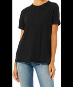 Person wearing a black t-shirt and blue jeans on a white background